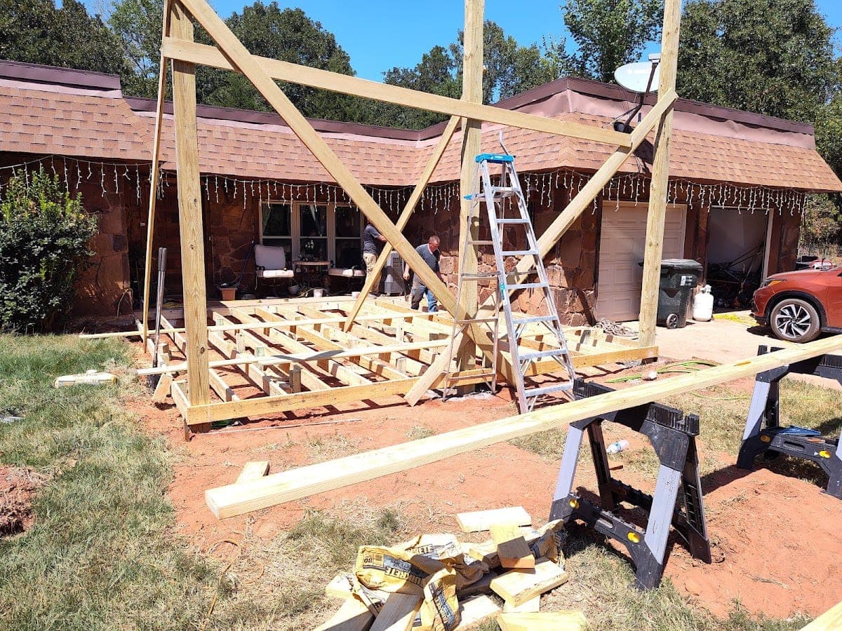 Floor-system framing of new covered patio addition at stone home